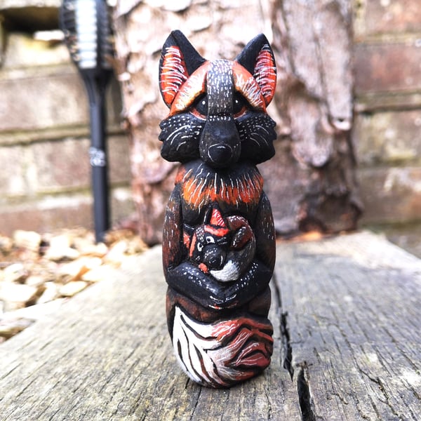 Melanistic Fox and baby Wood Carving