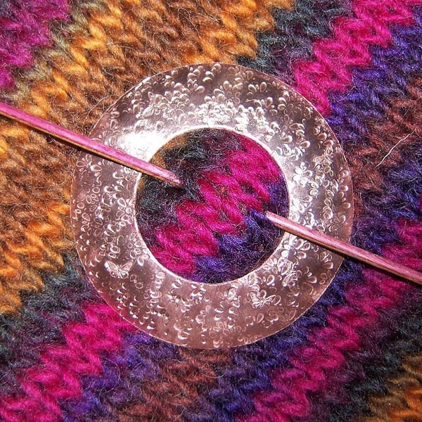 Shawl pin in textured flower imprinted copper