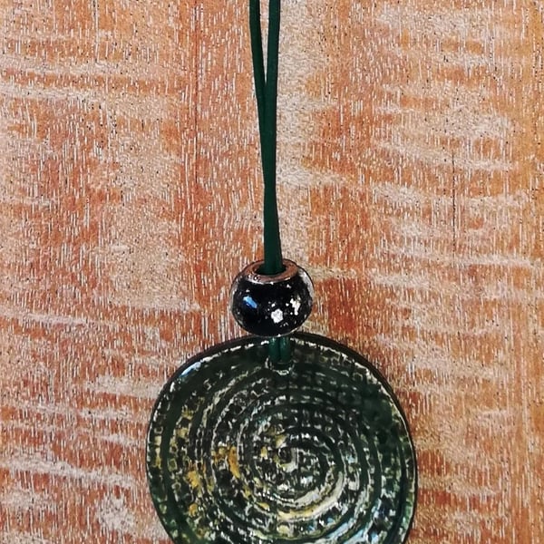 Stoneware dark green disc dangler