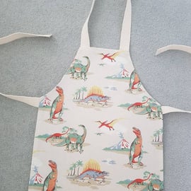 Cath Kidston Child and Adult Apron in PVC coated Dinosaur fabric