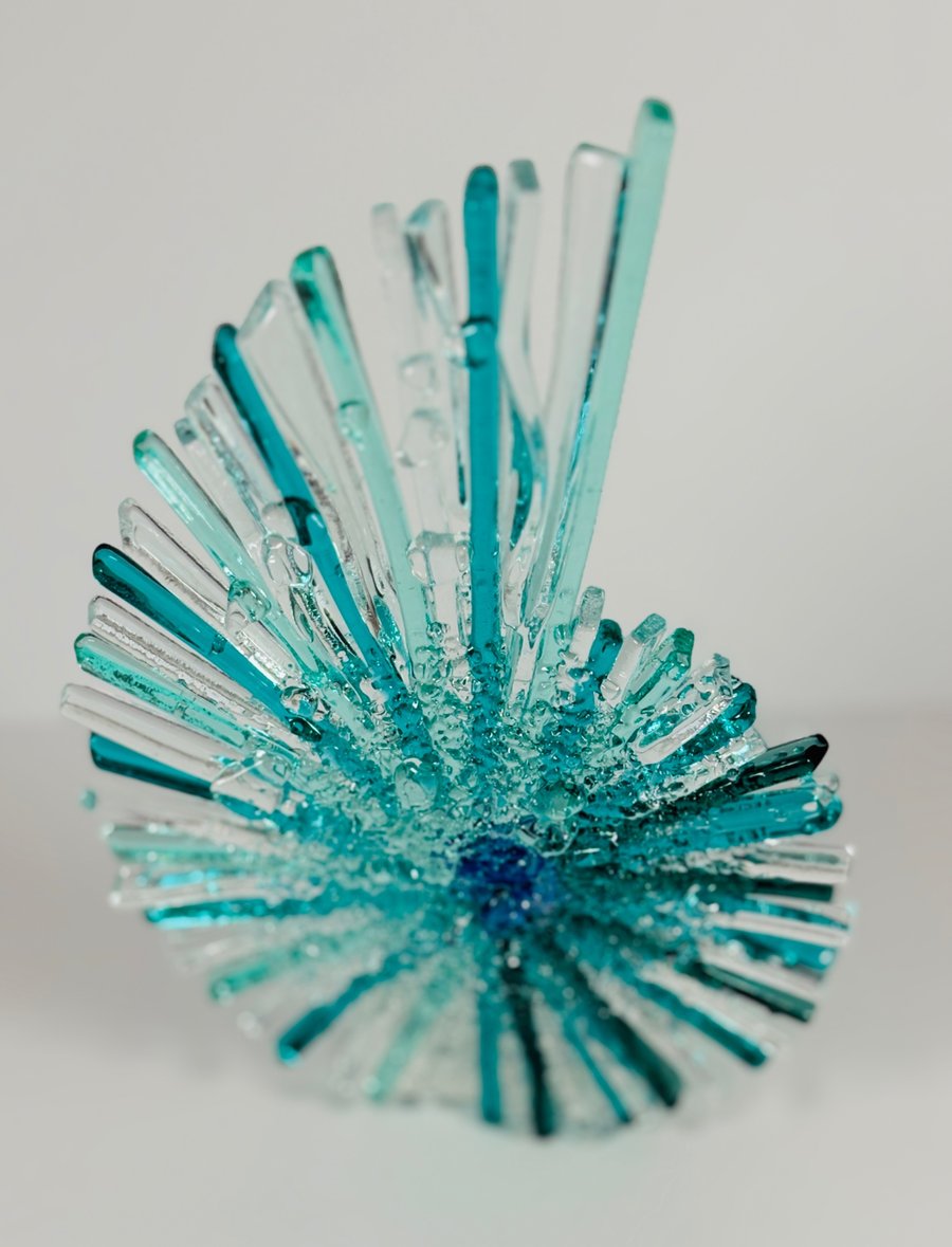 Ammonite in sea coloured fused glass 