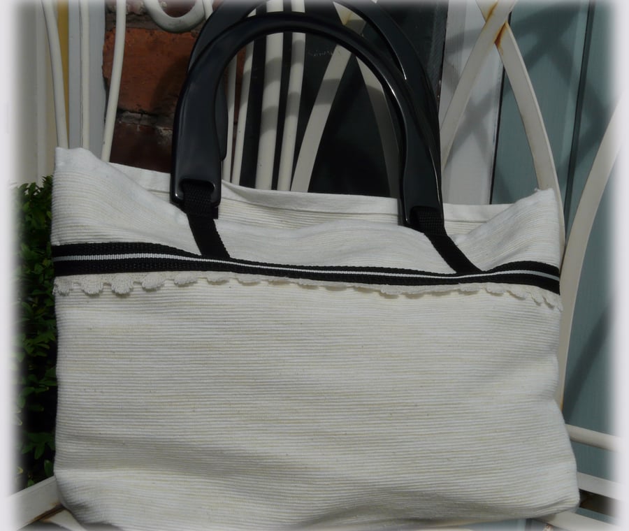 Handmade Cream and Black Solid Handled Handbag.