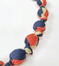 Orange, Black  & Cream or Straw Coloured Slogan Liberty Print Fabric Necklace - Image 2