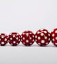 Handmade red and white patterned lamp work glass beads - Image 5