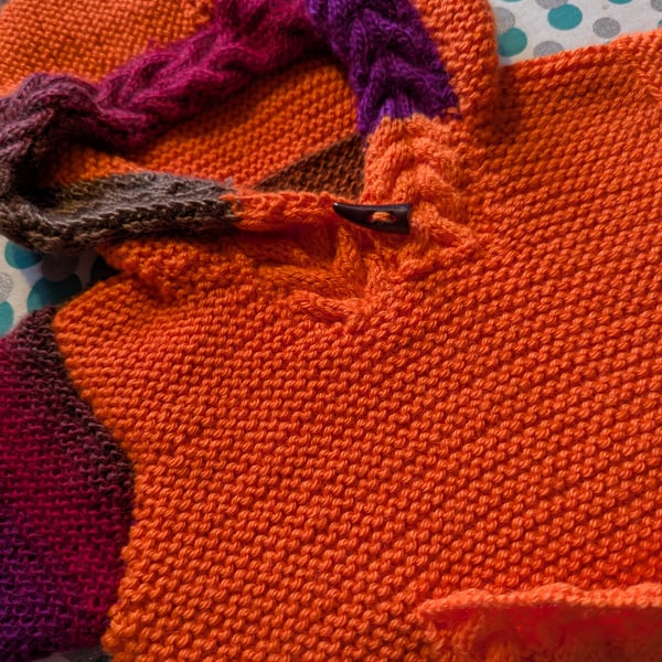 The Aura Jumper where warm meets whimsy. Uniquely constructed unisex jumper.
