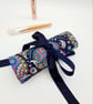 Navy blue make up wrap with colourful pattern.  - Image 5