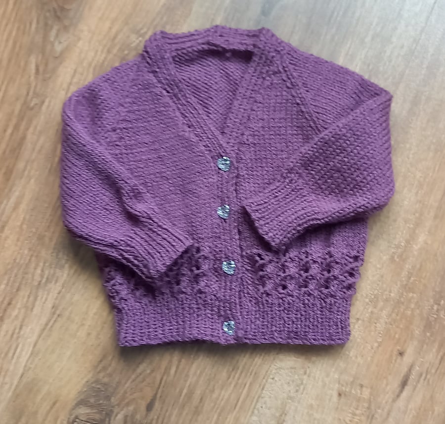 Hand knitted baby girls v neck cardigan