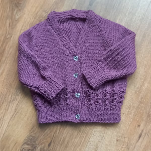 Hand knitted baby girls v neck cardigan