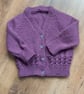 Hand knitted baby girls v neck cardigan - Image 1