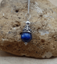 Minimalist cone kyanite pendant necklace - Image 1