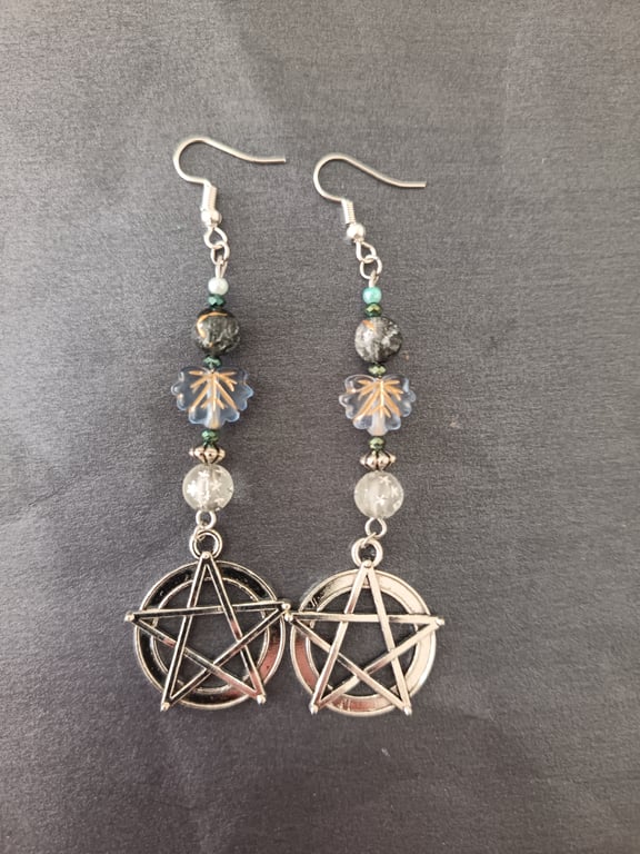 Beaded silver pentacle dangle earrings with icy leaves 