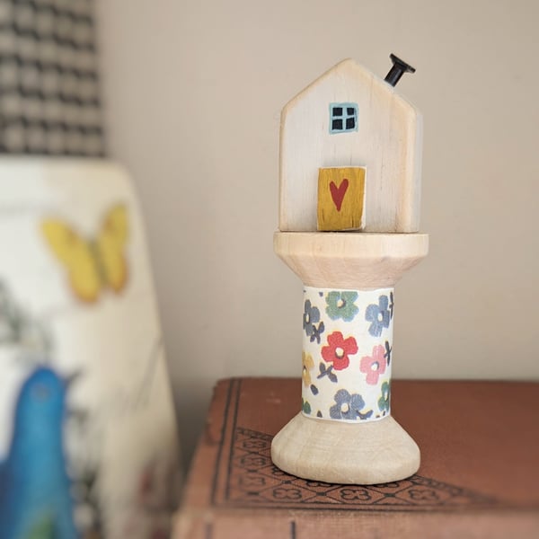 Little Wooden House on a Floral Wooden Bobbin 