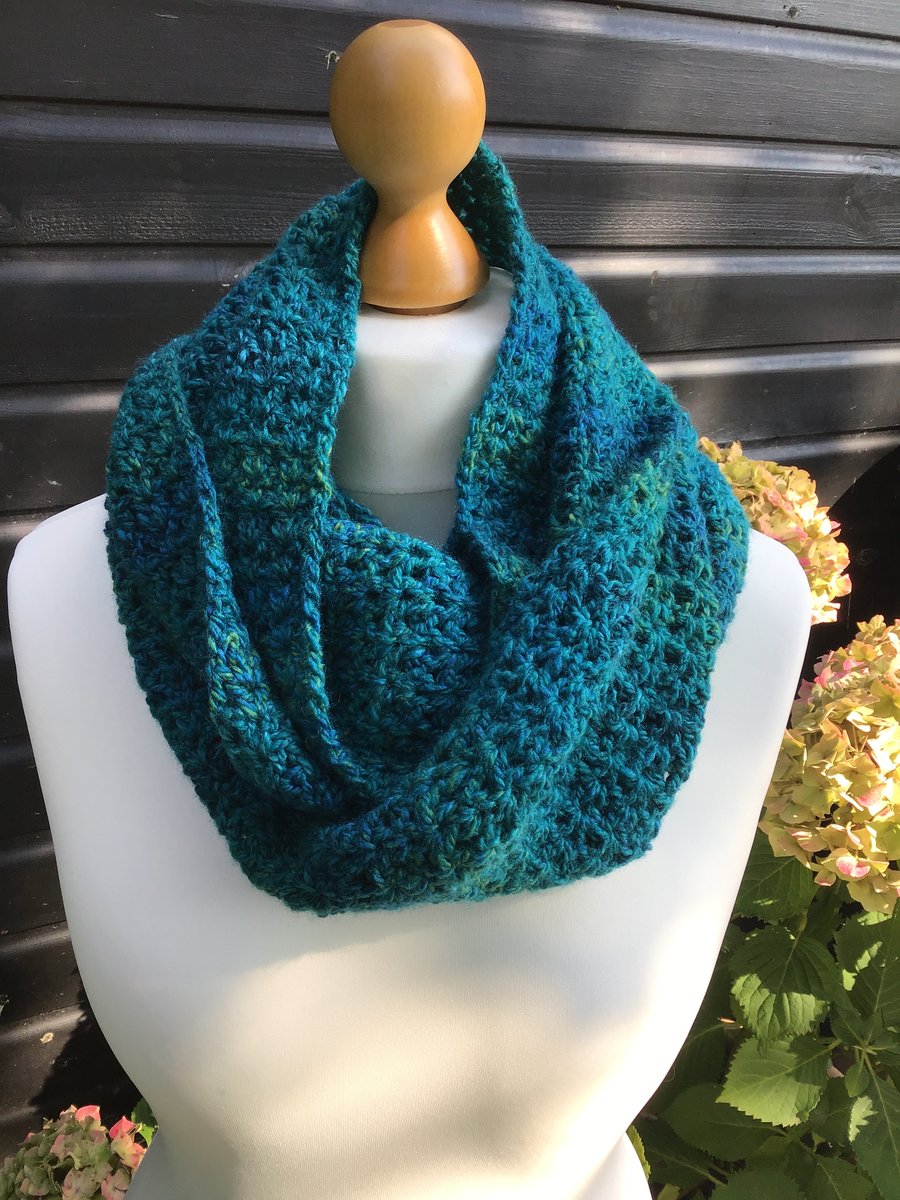 Beautiful Infinity scarf in dk green marble yarn.