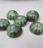 6 Small Forest Green Half-round Ceramic Flower Beads - Image 1