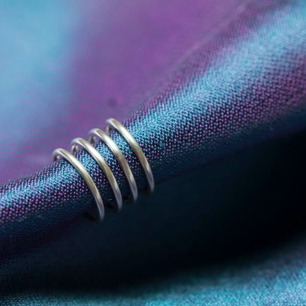 Four hooped ear cuff in Sterling Silver. Brush matt texture or mirror finished