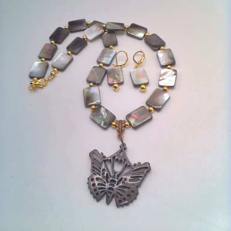 Necklace with Shell Rectangles Gold Beads and a Butterfly Pendant and Earrings