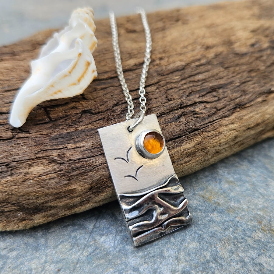 Silver mountains, landscape pendant with amber sun 