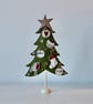 'Christmas Tree on a Wooden Stand Three'