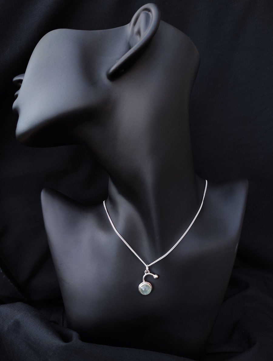 Silver pendant with prehnite