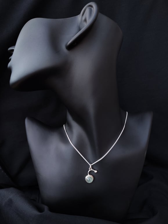 Silver pendant with prehnite