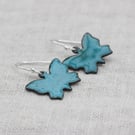 Teal enamel butterfly dangly earrings