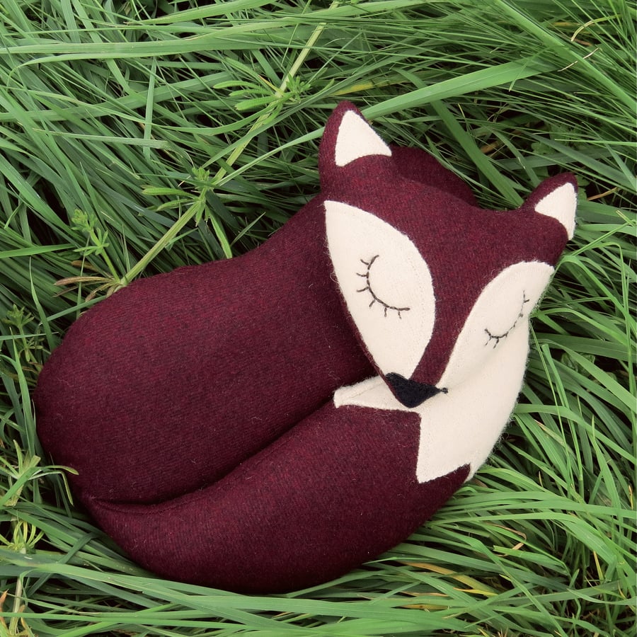 A fox doorstop.  A snoozy fox made from aubergine wool.  Fox decor.