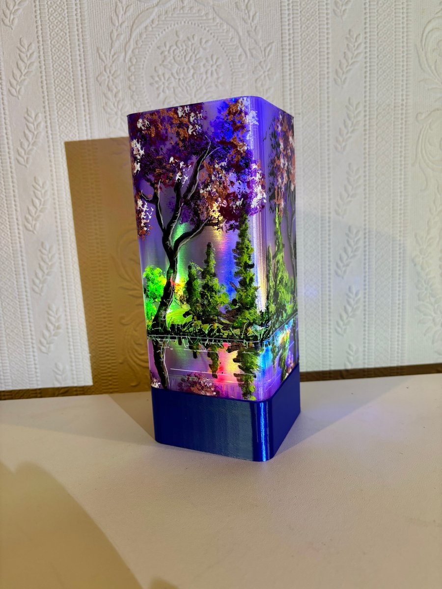 A hand painted and sealed lamp by Andrew jenkins