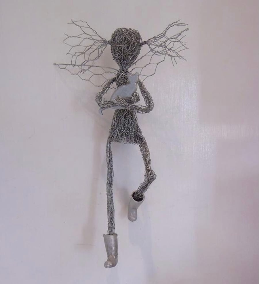 Garden fairy with a cat