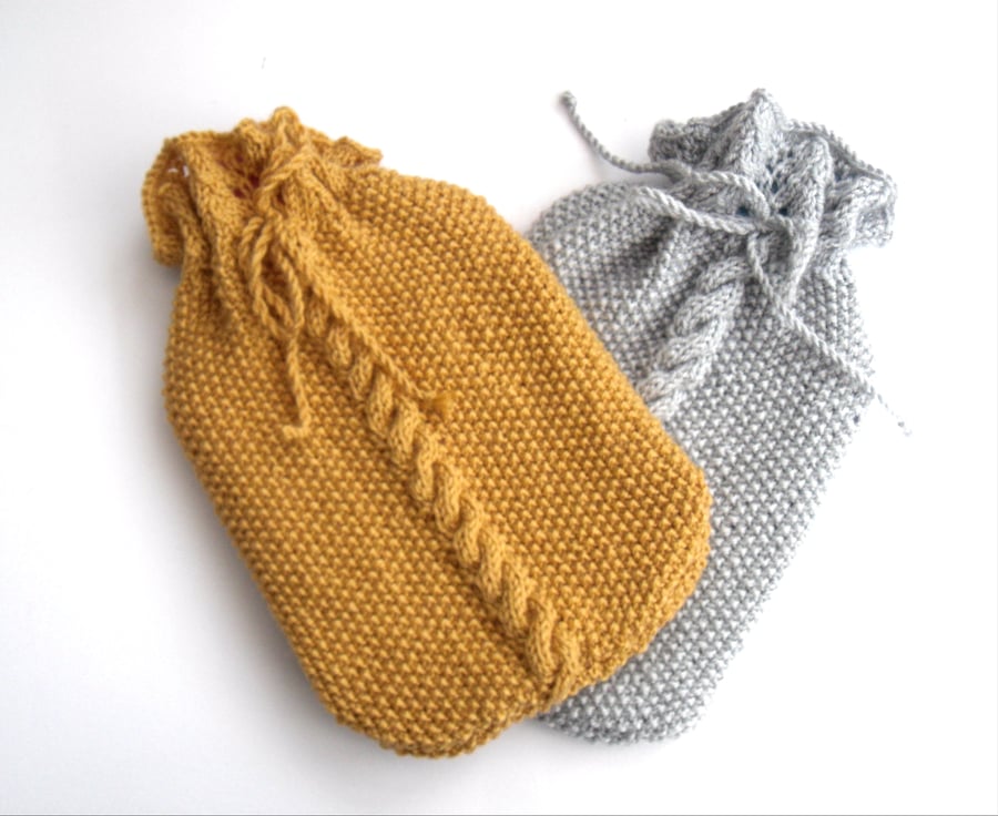 Hand knit cable hot water bottle cover. Silver Folksy
