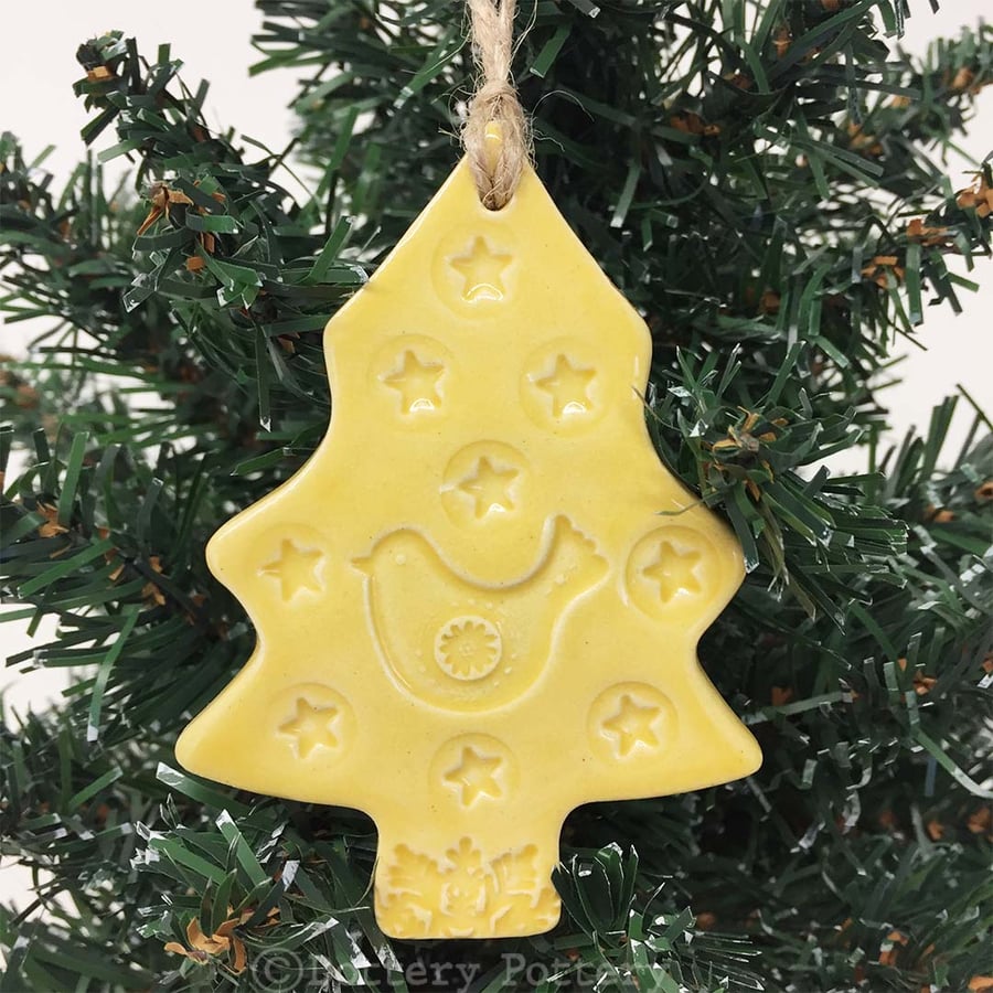 Yellow Ceramic Christmas tree decoration with bird and star Pottery decoration
