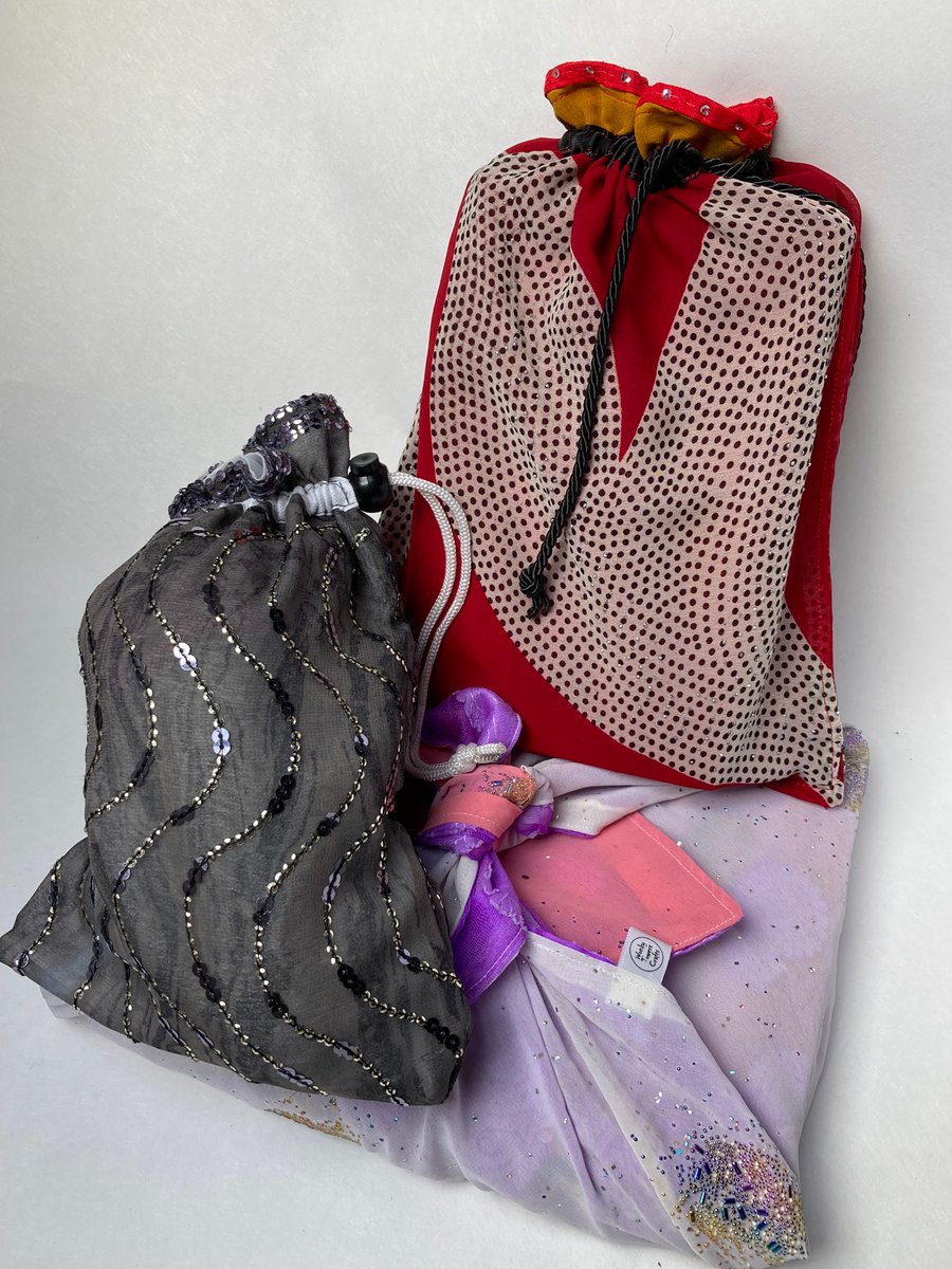 Three gift wrap bags made from sari fabric