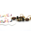 Small dangling paper bead earrings