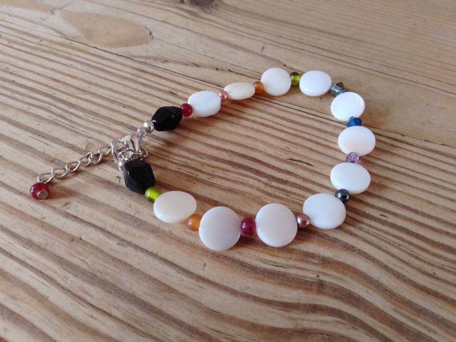 Handmade bracelet made using pre-loved beads.