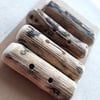 Four chunky driftwood buttons