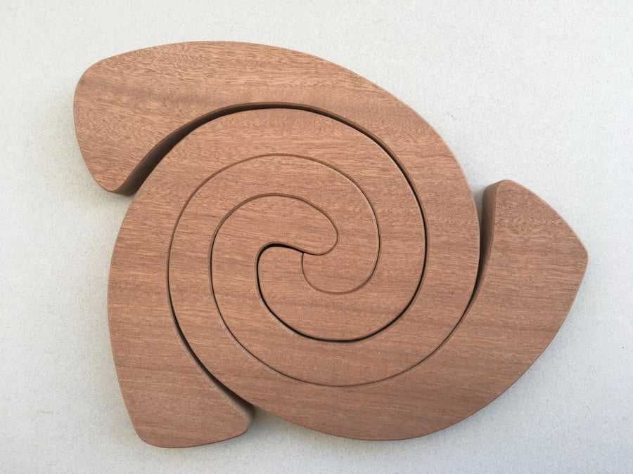 Curly Wurly Trivet in either Sapele or Tulipwood