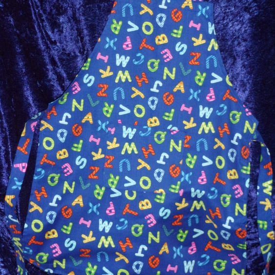 Childs Apron with Colourful Alphabet on Blue