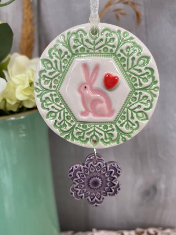 Ceramic decoration with rabbit and flower green