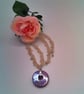 Iridescent Lilac Ceramic Donut Pendant on a Rose Quartz Chip Bead Necklace - Image 2