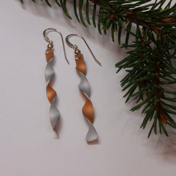 Twisted Ribbon earrings, golden orange and silver coloured 