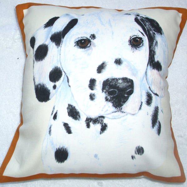 Portrait picture of a Dalmation pup facing forward cushion,