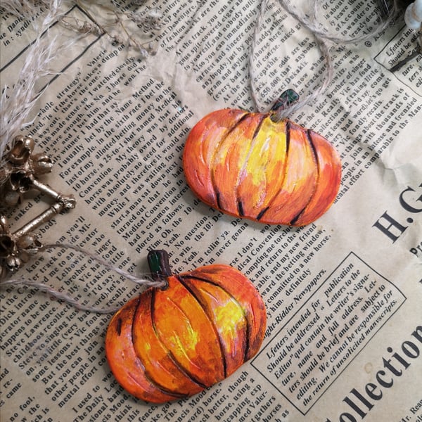 Small clay hanging pumpkin. 