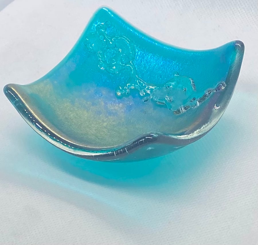 Fused glass dish in peacock blue irid glass