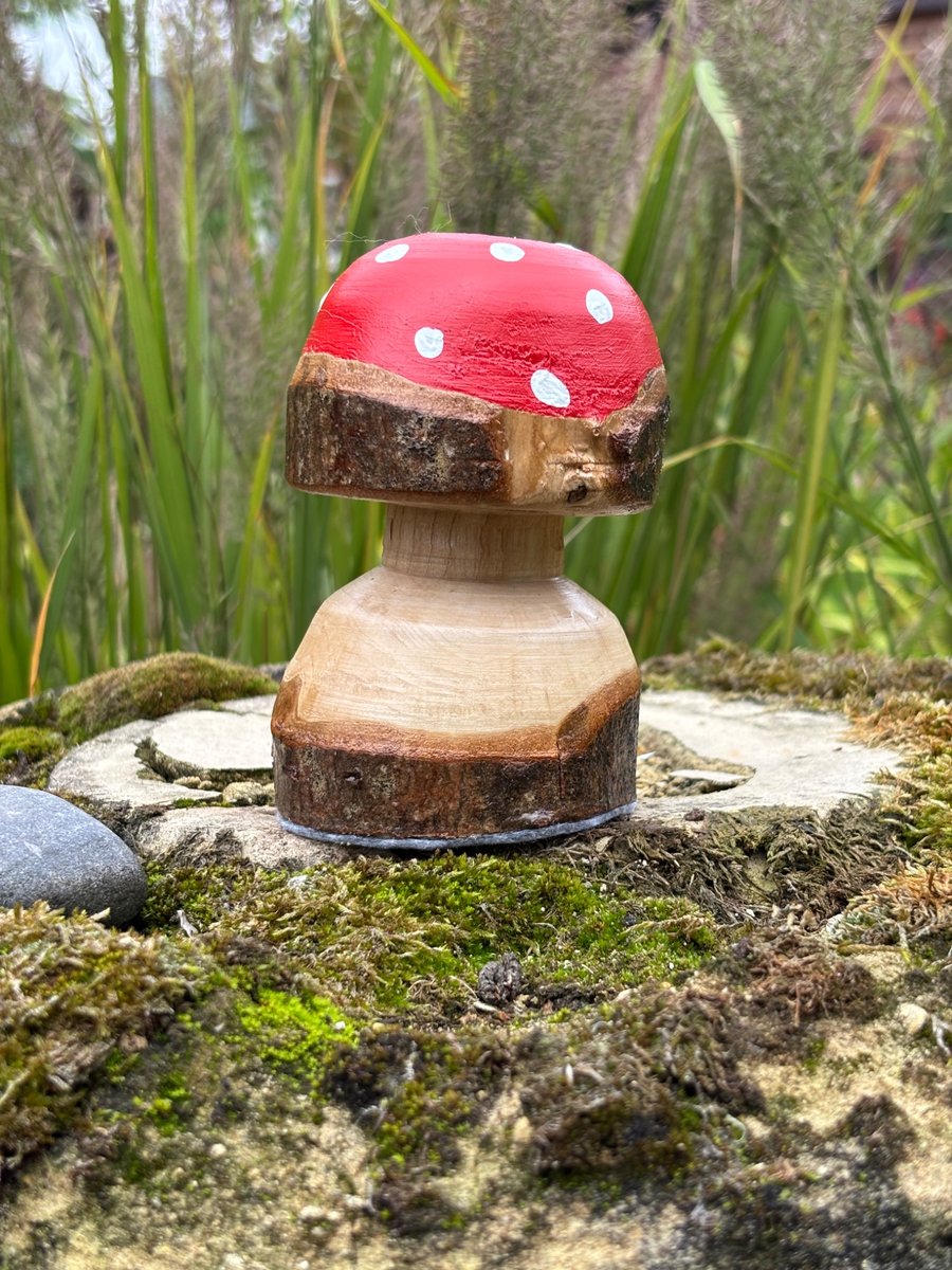 Decorated wooden toadstool