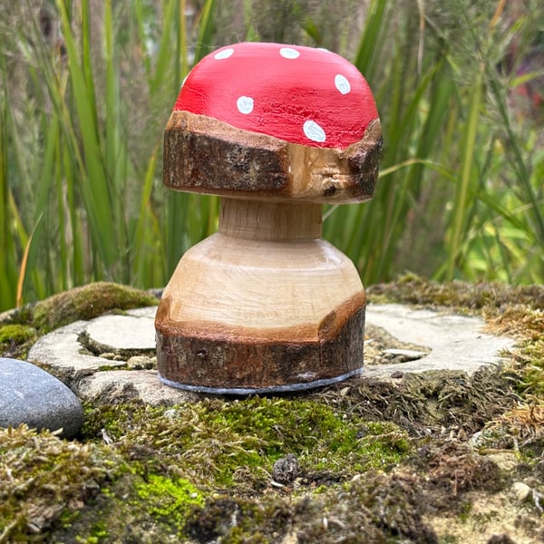 Decorated wooden toadstool