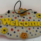 Hanging WELCOME sign