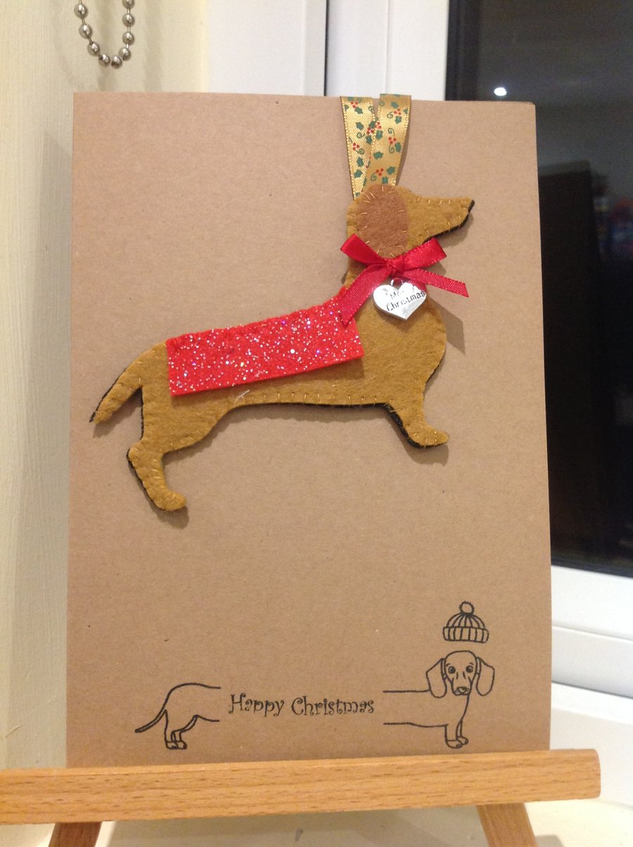 Handmade felt dachshund attached to card with envelope.