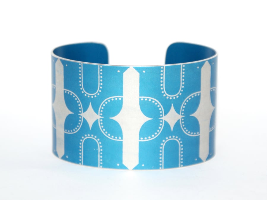 Geometric bird print aluminium cuff blue