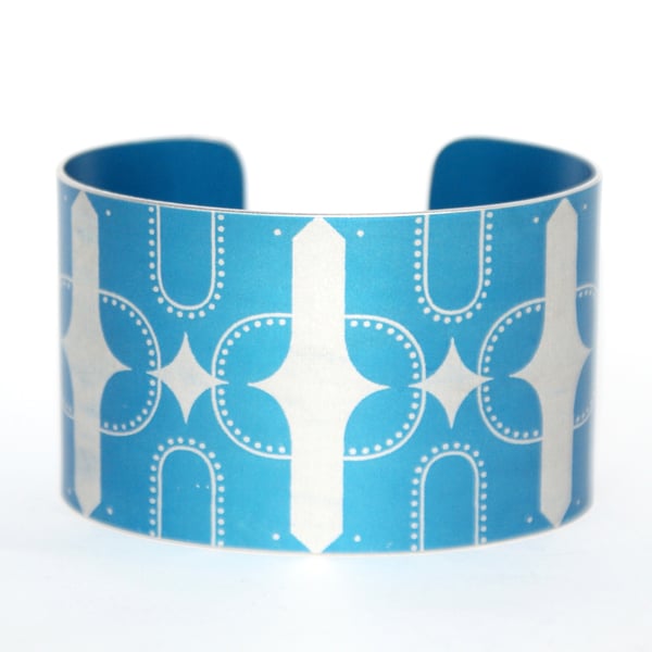 Geometric bird print aluminium cuff blue