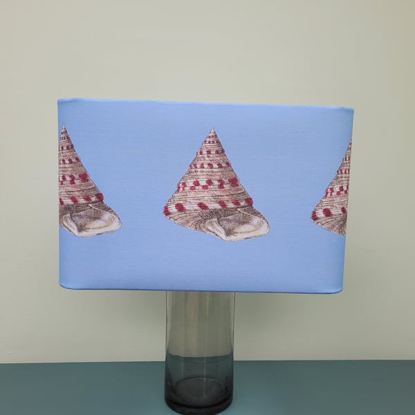 Rectangular lampshade with rounded corners featuring a vintage shell design