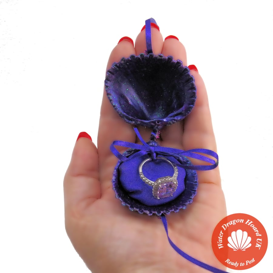 Unique purple shell engagement ring box, ideal for romantic coastal proposal
